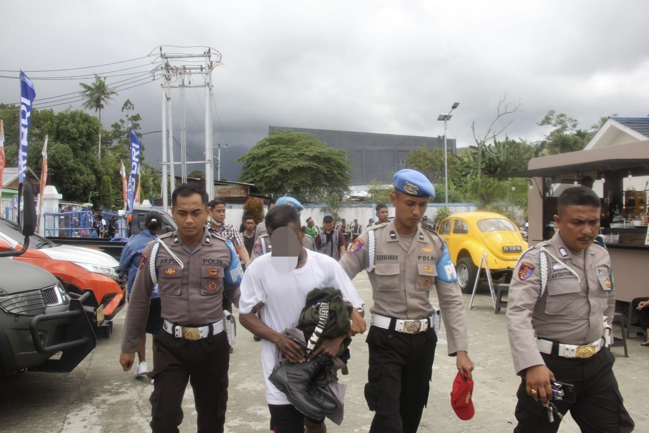 Terobsesi Jadi Anggota Polri, Seorang Pemuda Ditangkap Saat Pembukaan KMAN VI 